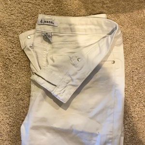 White Bermuda shorts.